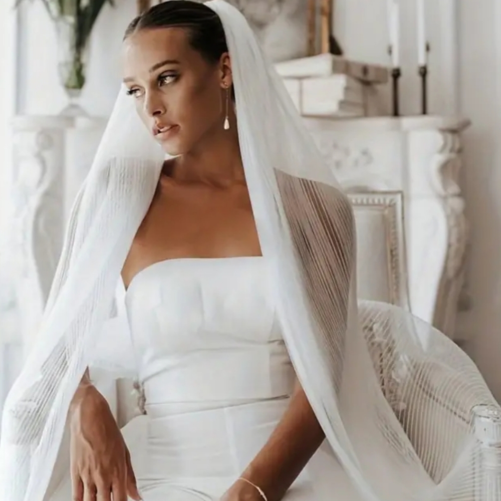 Unique slight pattern off white veil chapel length